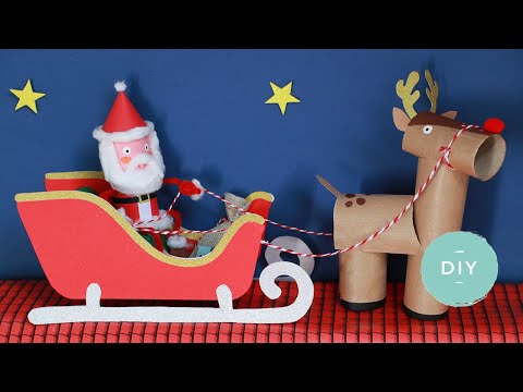 De arrenslee van de kerstman maken van een kartonnen doosje