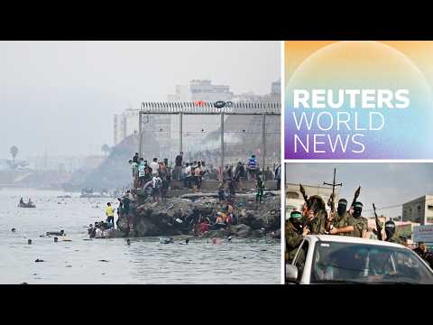 Spain deploys military as tens of thousands of migrants arrive in Ceuta | Reuters World News
