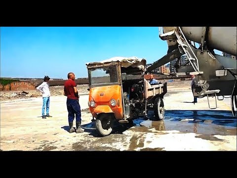 Three wheeled dumper in operation | Delivery of concrete to the construction site