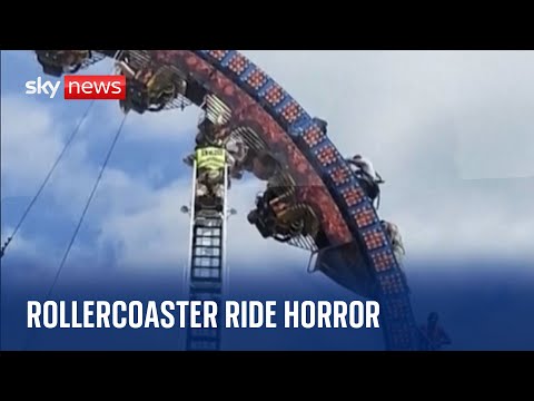 Don't look down! Rollercoaster riders stuck upside down for three hours