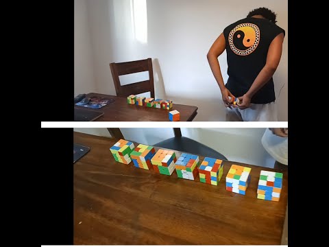 SOLVING 7 RUBIK'S CUBES BEHIND BACK