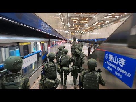 Taiwan's military conduct drills on beaches and Taipei metro | AFP