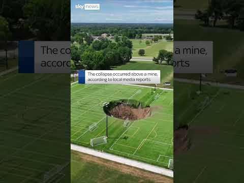 The moment a field collapses as sinkhole opens