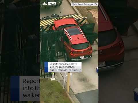 Gates of FBI offices rammed by suspect in car in Georgia