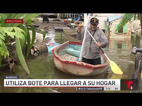 Bajo agua sector en Morovis: hombre solo puede llegar a su casa en bote