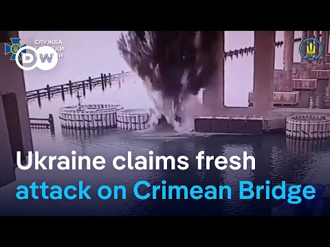 Ukraine says it hit Russia's bridge to Crimea with underwater bombs | DW News