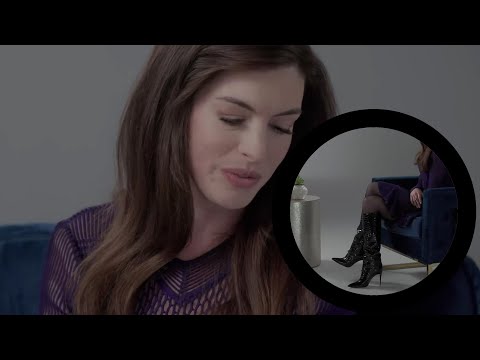 Anne Hathaway boots and black Sheer Tights