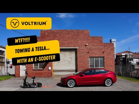 Towing a Tesla Model 3 Long Range... With an E-scooter