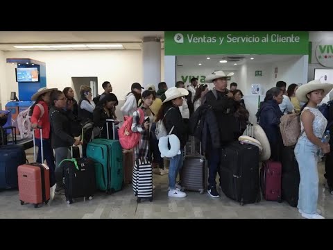 Passengers at Mexico City airport face uncertainty and long waits after global outage hits flight op