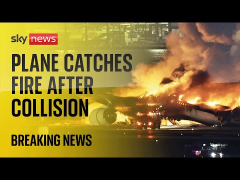 Watch live: Hundreds of passengers escape after jet collides with small plane in Japan