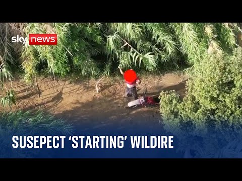 Drone footage shows suspected arsonist after Italy wildfire