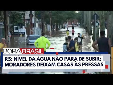 Moradores deixam casas às pressas em Porto Alegre