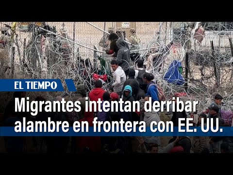 Migrantes intentan derribar alambre de púas en frontera entre México y EE. UU. | El Tiempo