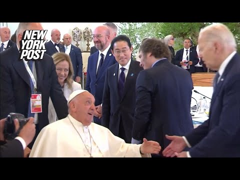 Biden embraces surprised-looking Pope Francis with forehead-to-forehead hug at G7 summit