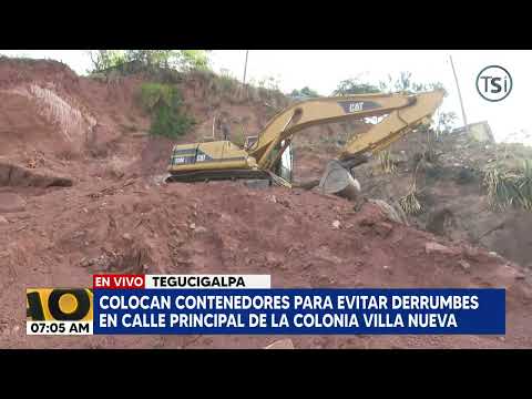 Colocan contenedores para evitar derrumbes en calle principal de la Colonia Villa Nueva