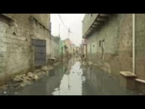 Monsoon rains bring flooding and misery to Karachi residents
