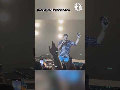 Luke Bryan brushes off onstage fall after slipping on fan's phone