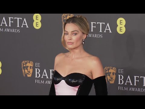 Stars including Florence Pugh, Barry Keoghan and Michael J. Fox pose at the BAFTA Film Awards