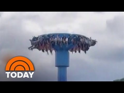 Amusement park riders stuck upside down for nearly 30 minutes