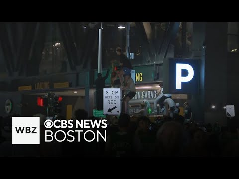 Fans pour out of bars surround TD Garden to enjoy Celtics win