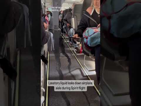Liquid Leaks Down Airplane Aisle From Lavatory