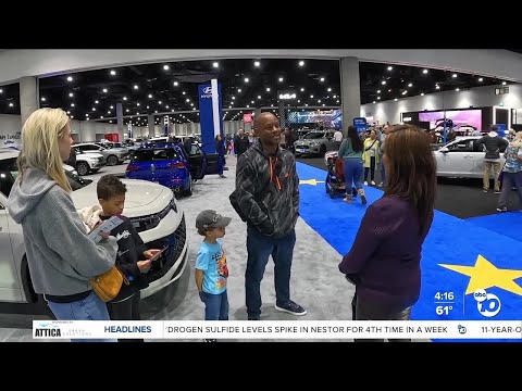 10News anchor Marie Coronel speaks to San Diego Auto Show attendees