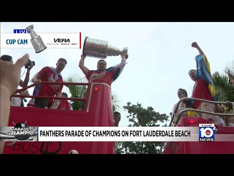 Panthers players show off Stanley Cup from double-decker bus