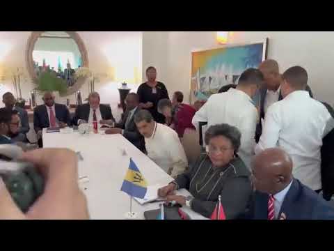 Presidents Irfaan Ali and Nicolas Maduro exchange handshakes upon meeting