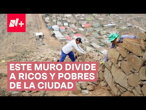 Derriban muro de la vergüenza que dividía a ricos y pobres en cerro de Lima, en Perú - N+