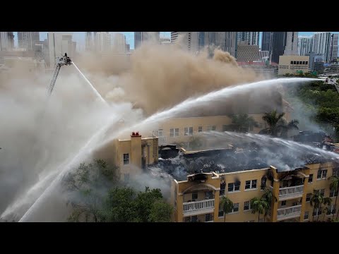 Drone footage of massive fire in apartment building near downtown Miami