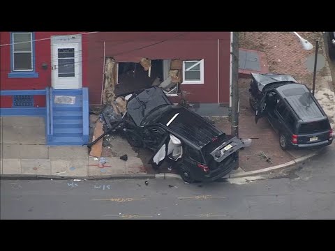 Building heavily damaged after crash involving police SUV in Trenton, New Jersey