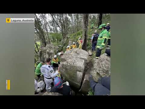 Woman wedged upside down between rocks for 7 hours after trying to retrieve her phone