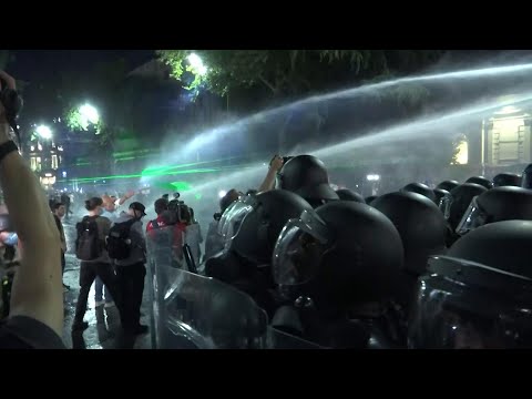 Georgian police make arrests as attempts to disperse Tbilisi protest crowd continue