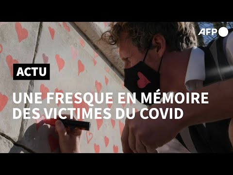Londres: une fresque de 150.000 cœurs en souvenir des victimes du Covid | AFP