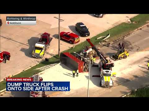 Dump truck flips onto side after crash in Addison, police say