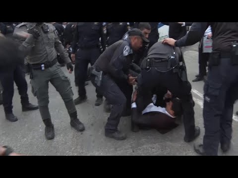 Israeli police use water cannon to clear ultra-Orthodox protesters outside Supreme Court hearing