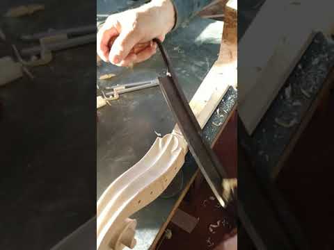 Rough shaving of a cello neck.