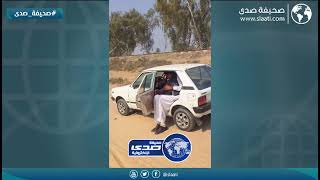 اطول رجل في العالم متوهق مع السيارة