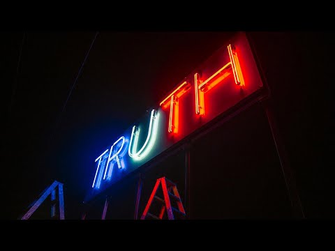 Stefan Brüggemann installs TRUTH/LIE neon lights at US-Mexico border on election day