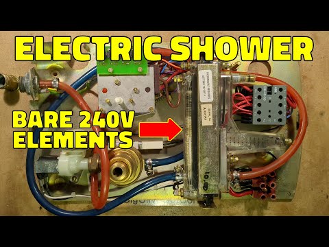 Inside a vintage electric shower with bare 240V elements in the water