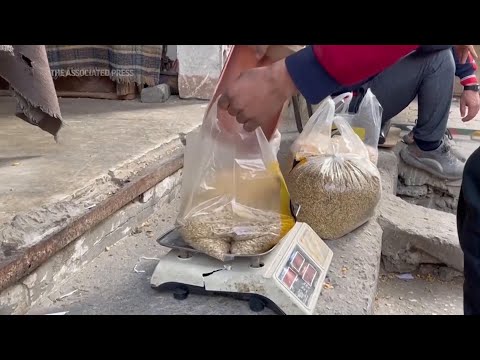 Palestinians in Gaza resort to animal fodder to make bread as food shortage intensifies