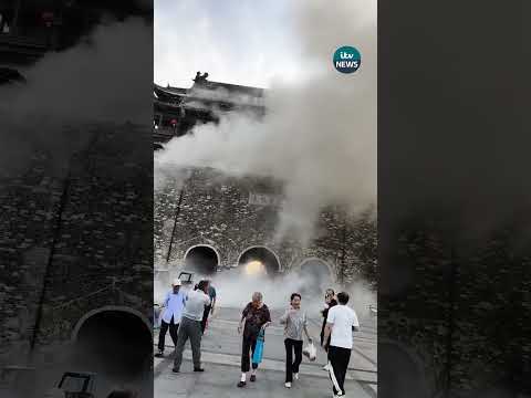 Moment tiles from centuries-old Chinese tower fall from roof | ITV News