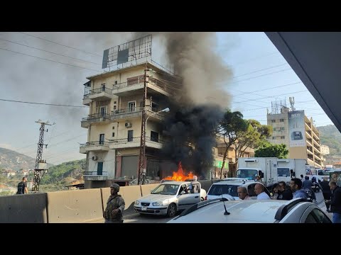 Aftermath of strike on car near Beirut | AFP