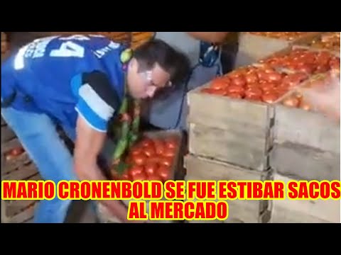 MARIO CRONENBOLD CARGANDO CAJONES DE TOMATES EN EL MERCADO...