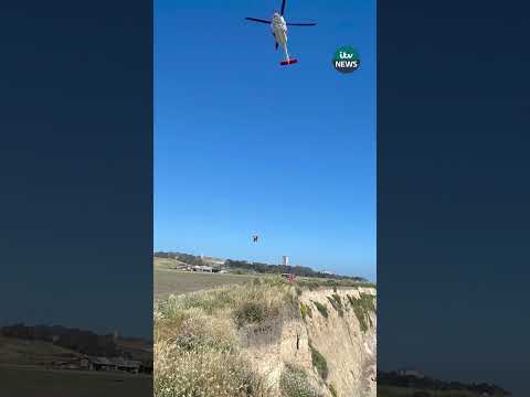 Stranded California kite surfer rescued after spelling out ‘HELP’ on beach