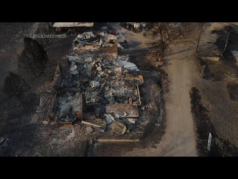Wildfire flames menace multiple towns in Texas