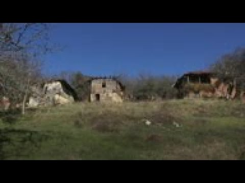 Kosovo divide lifts for ill Serb in ghost village