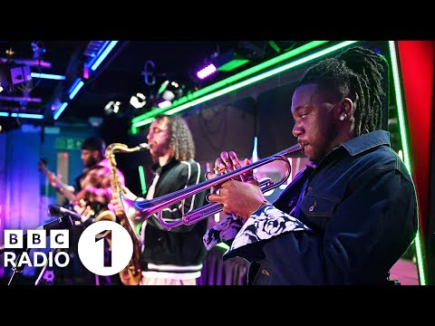 Ezra Collective - God Gave Me Feet For Dancing ft. (ft. Yazmin Lacey)
(Live Lounge)