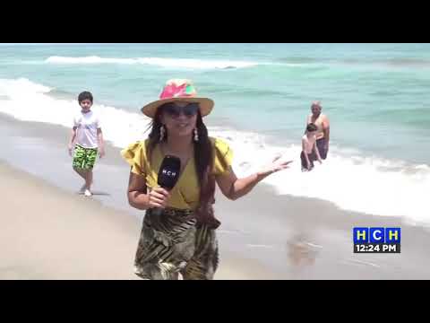 ¡Verano 2023! Familias completas disfrutan de las cálidas aguas de playa Escondida, Atlántida