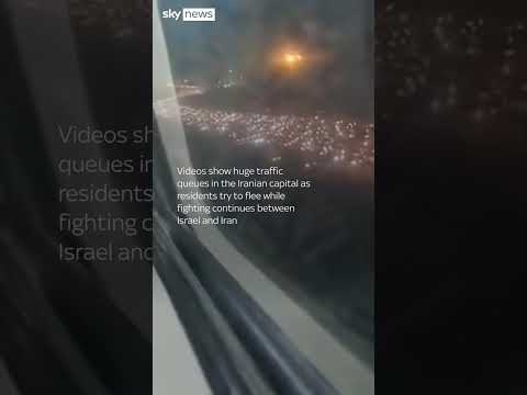 Iran: Thousands of residents flee Tehran as Trump warns 'leave immediately'